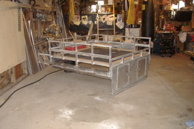 slides into truck , screw angle to bed sides.