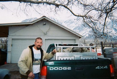 regular box, slides in between wheelwells